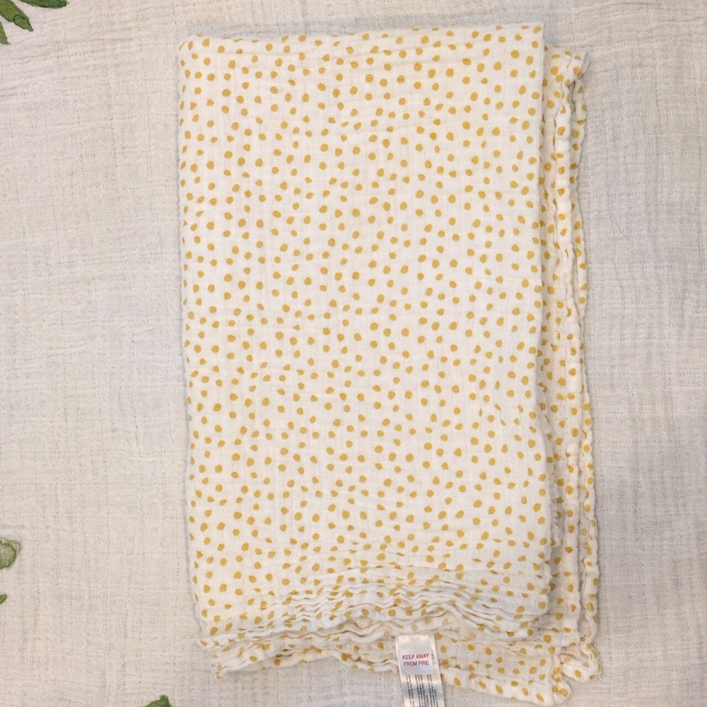Yellow polka dot muslin swaddle